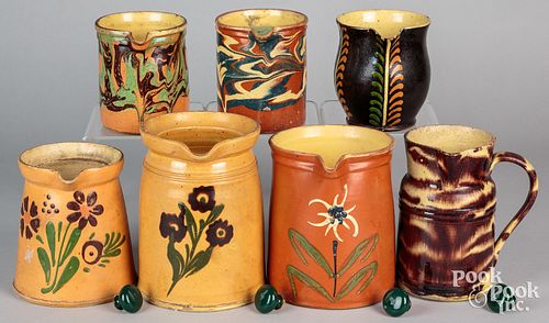Seven French redware pitchers, 19th c.