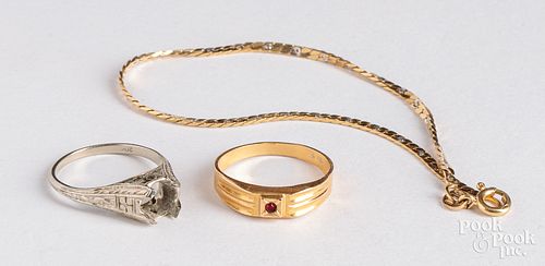 18K gold ring and bracelet and a gold ring