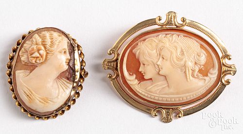 Two 10K gold cameo pins.