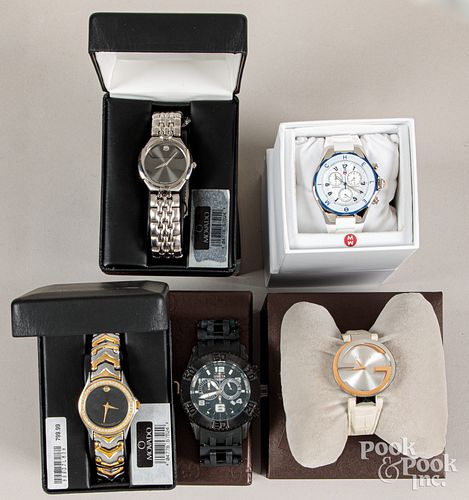 Five assorted wristwatches.