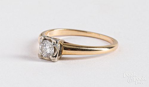 14K gold diamond solitaire ring, 1.1 dwt.