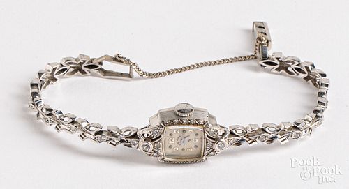 Lady Elgin 14K gold and diamond wristwatch