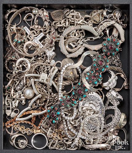 Group of silver and silver tone jewelry.