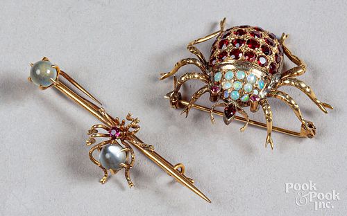 Two 14K gold spider brooches, 6.8 dwt.