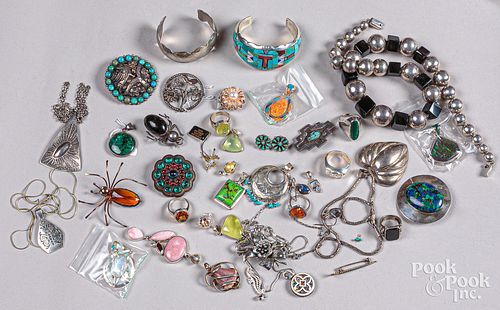 Group of silver jewelry.