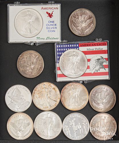 Twelve 1 ozt. fine silver coins.