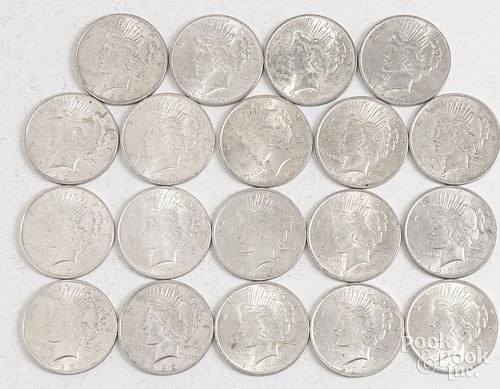 Nineteen 1922 Peace silver dollars.