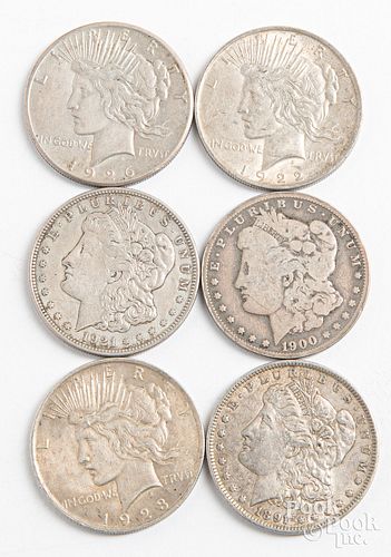 Six silver dollars