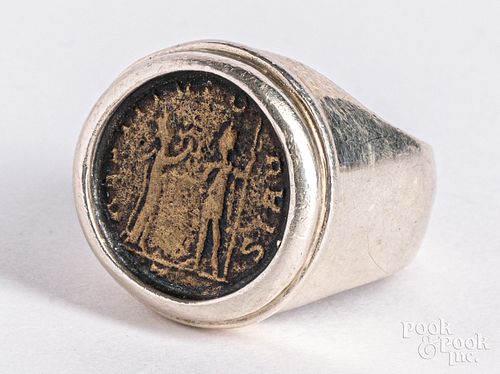 Roman coin mounted in a silver ring.