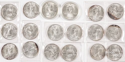 Eighteen 1 ozt. fine silver liberty eagle coins.