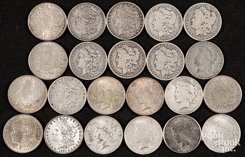 Twenty-two silver dollars