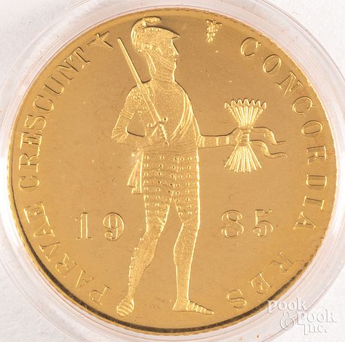 1985 gold ducat, 3.494g .983 purity.