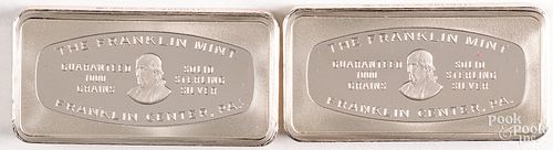 Two 1000 grain sterling silver ingots.