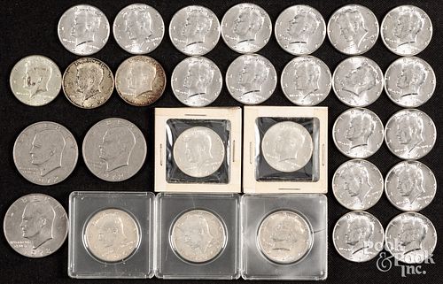 Twenty-three 1964 Kennedy silver half dollars, etc