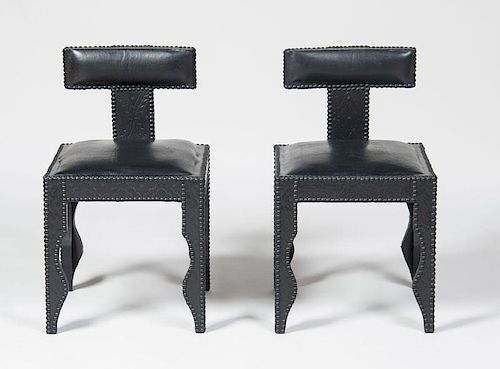 PAIR OF BRASS-STUDDED LEATHER KLISMOS CHAIRS