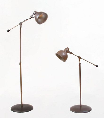 TWO BROWN ENAMELED METAL FLOOR LAMPS