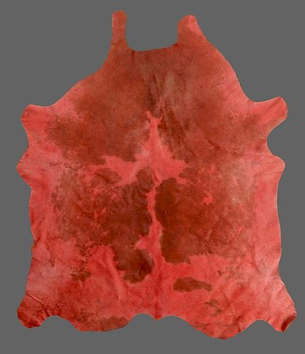 RED-STAINED COWHIDE RUG