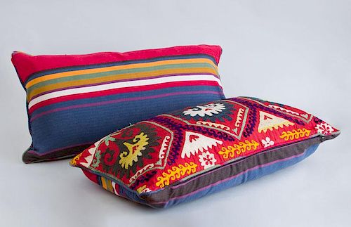 TWO UZBEX EMBROIDERED FABRIC-MOUNTED PILLOWS