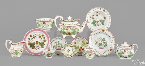 Strawberry pattern Staffordshire, 19th c., to include a teapot, 7'' h., a sugar, a creamer