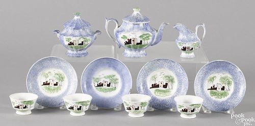 Miniature blue spatter fort tea service, to include a teapot, 4 1/4'' h., a covered sugar