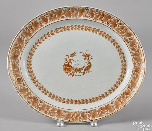 Chinese export porcelain platter, 19th c., with orange floral decoration, 14 1/2'' l., 17'' w.