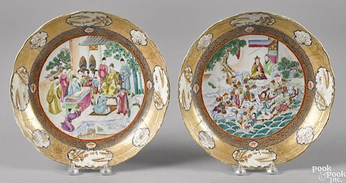Two Chinese export porcelain chargers, ca. 1800, depicting immortals in combat and a nobleman