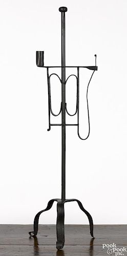Wrought iron candlestand, 18th c., with a rush light holder, 31 3/4'' h.