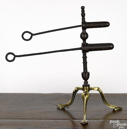 Double-barrel goffering iron, 19th c., with a brass tripartite base, 14 1/2'' h.
