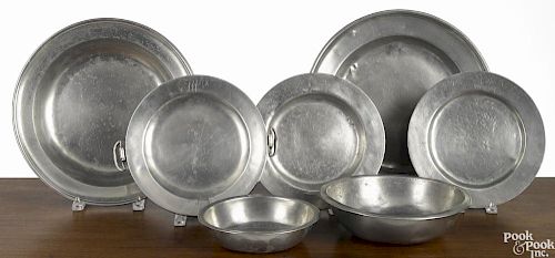 Seven pieces of English pewter, to include a Graham & War drop basin, two chargers, two plates