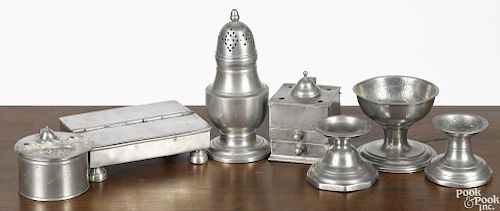 Pewter tablewares, 19th c., mostly English, to include a shaker, 7'' h., three master salts
