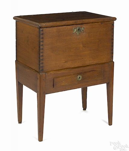 Southern Federal walnut cellarette, ca. 1810, the interior with dividers, 31'' h., 23 1/4'' w.