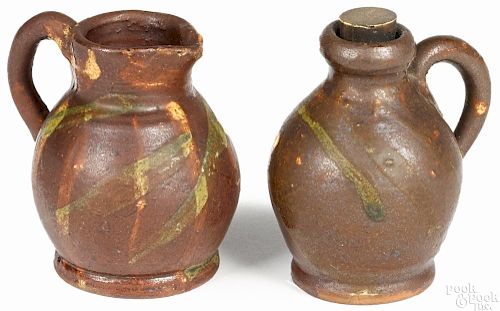 Miniature redware pitcher and jug, 19th c., with yellow and green slip decoration, 2 5/8'' h.
