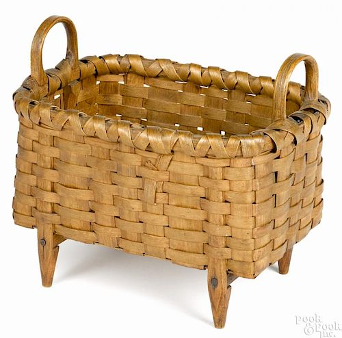 Split oak footed basket, late 19th c., 7 1/2'' h., 8 3/4'' w.