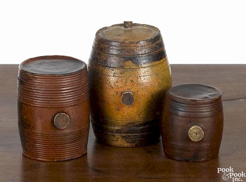 Three American redware rundlets, 19th c., 2 3/4'' h., 3 3/4'' h., and 4 1/2'' h.