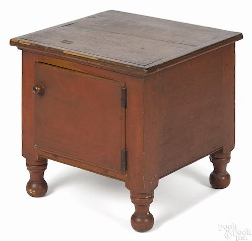 Sheraton painted pine commode, 19th c., retaining an old red surface, 18'' h., 19'' w.