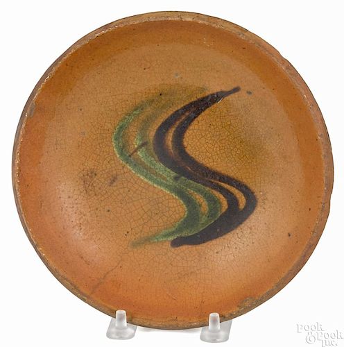 Pennsylvania redware pie plate, 19th c., with green and brown wavy slip lines, 6 3/4'' dia.