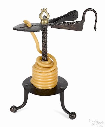 Elaborate Continental wrought iron wax jack, late 18th c.