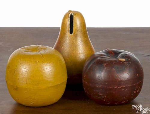 Three painted redware fruit-form banks, tallest - 4 1/4''.