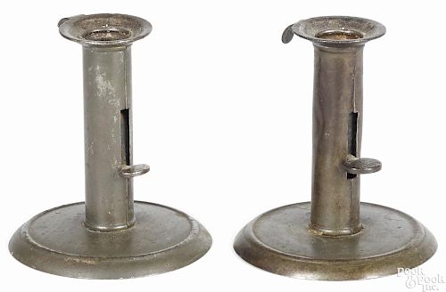 Pair of tin hogscraper candlesticks, pat. 1863 on ejectors, 4 1/4'' h.