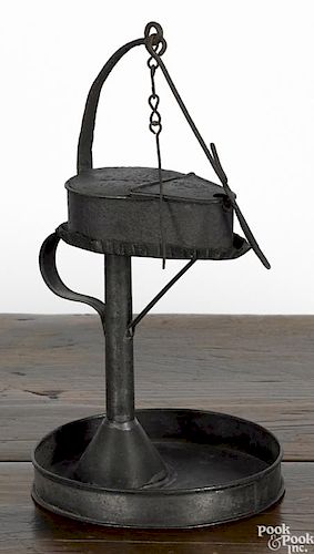 Tin fat lamp and stand, 19th c., 12'' h. Provenance: The Collection of Frank and Sue Watkins