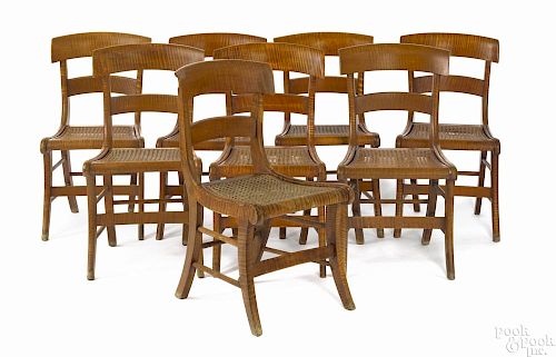Set of eight tiger maple saber leg dining chairs, ca. 1835.