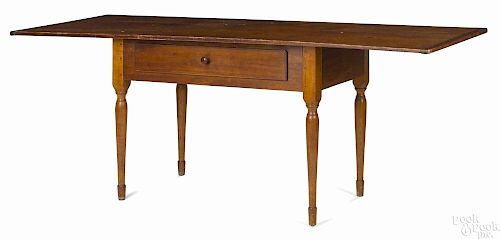 Shaker pine and cherry work table, ca. 1840, with a large overhanging top and a single drawer