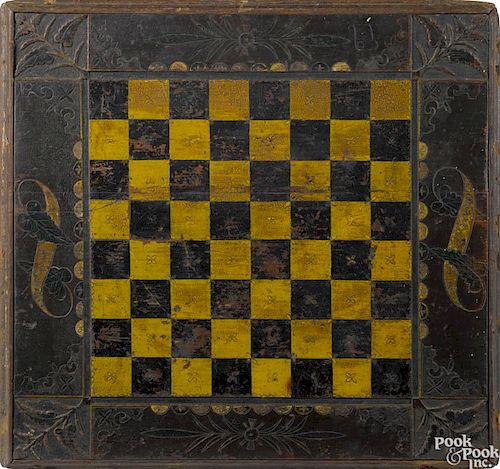 American carved and painted pine gameboard, 19th c., inscribed verso Executed by M. Richcreek