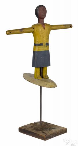 Painted pine whirligig, late 19th c., of a Native American