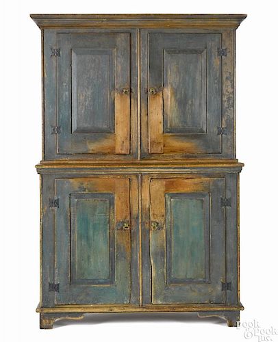 Painted pine two-part stepback cupboard, late 18th c., retaining a scrubbed blue surface