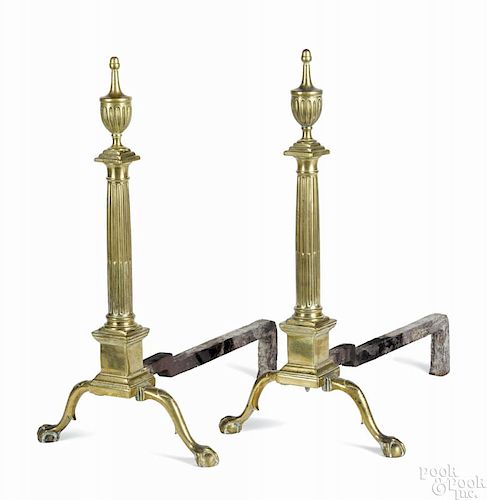Pair of Philadelphia, Pennsylvania Chippendale brass andirons, ca. 1780, in a tall columnar form