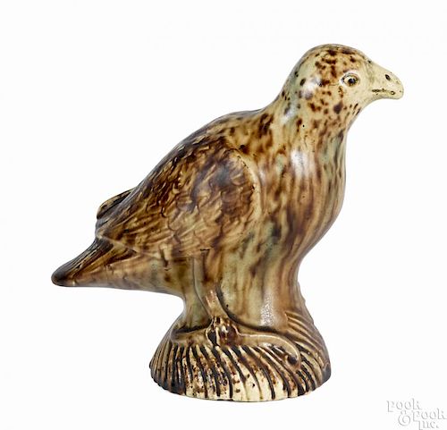English Staffordshire figure of a hawk, ca. 1800, resting on a spiral turned base