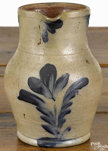 Pennsylvania Remmey type stoneware pitcher, 19th c., with cobalt tulip decoration, 7 1/4'' h.