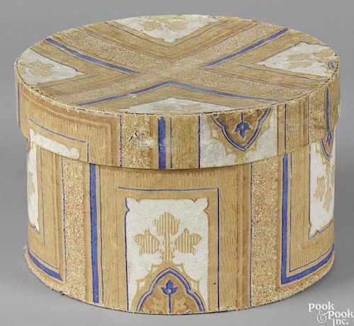 New England wallpaper covered hatbox, 19th c., 6 1/4'' h., 9 1/2'' w.
