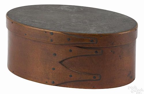 Shaker stained bentwood box, 19th c., of lapped finger construction, 3'' h., 7 1/4'' w.